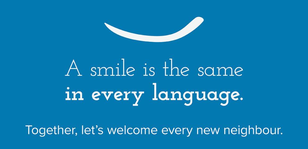 A smile is the same in every language. Together, let's welcome every new neighbour.